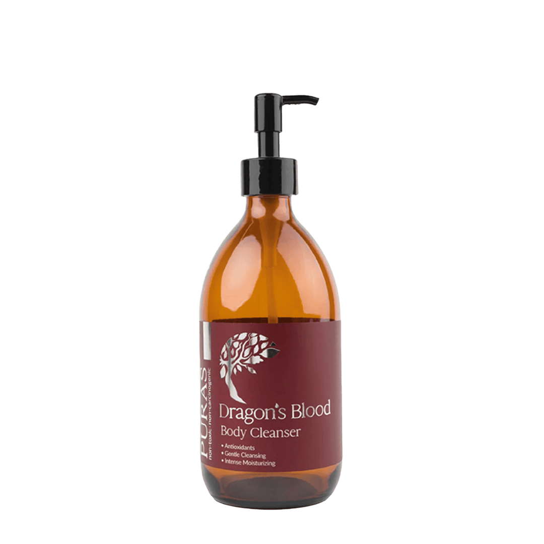 Bottle of 'Dragon's Blood' body cleanser with a pump on a plain background