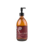 Bottle of 'Dragon's Blood' body cleanser with a pump on a plain background