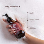 Hand holding a bottle of Dragon's Blood Face Wash with text on benefits on a textured background