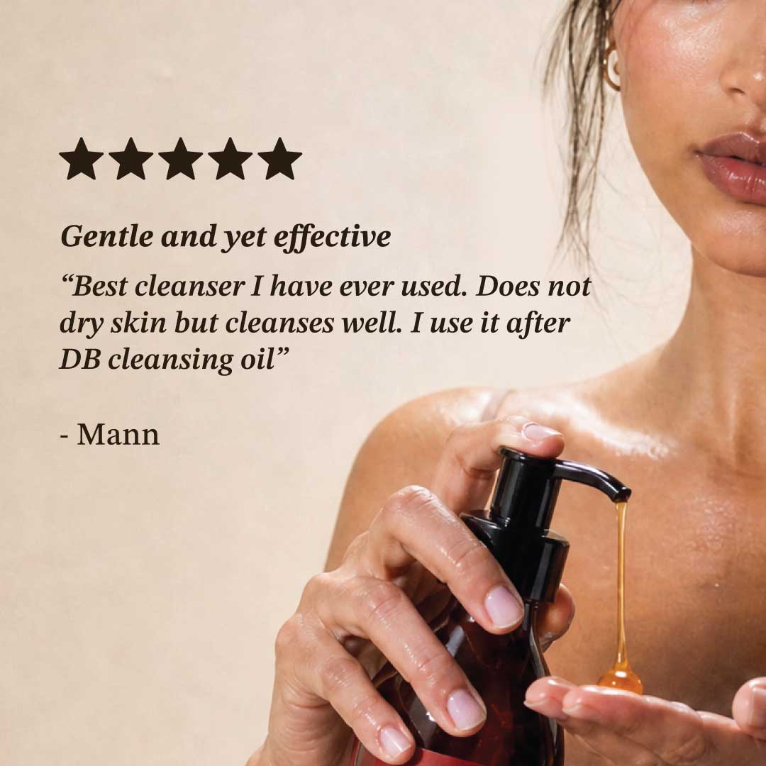Person holding a skincare product with text about its effectiveness
