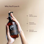 Hand holding a bottle of Geranium & Patchouli Hand Wash with text on a beige background