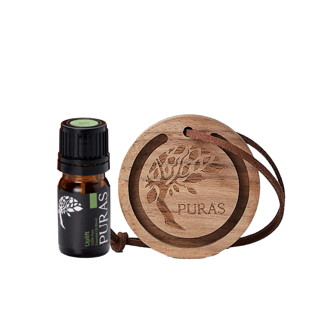 Essential oil bottle with wooden diffuser on a white background