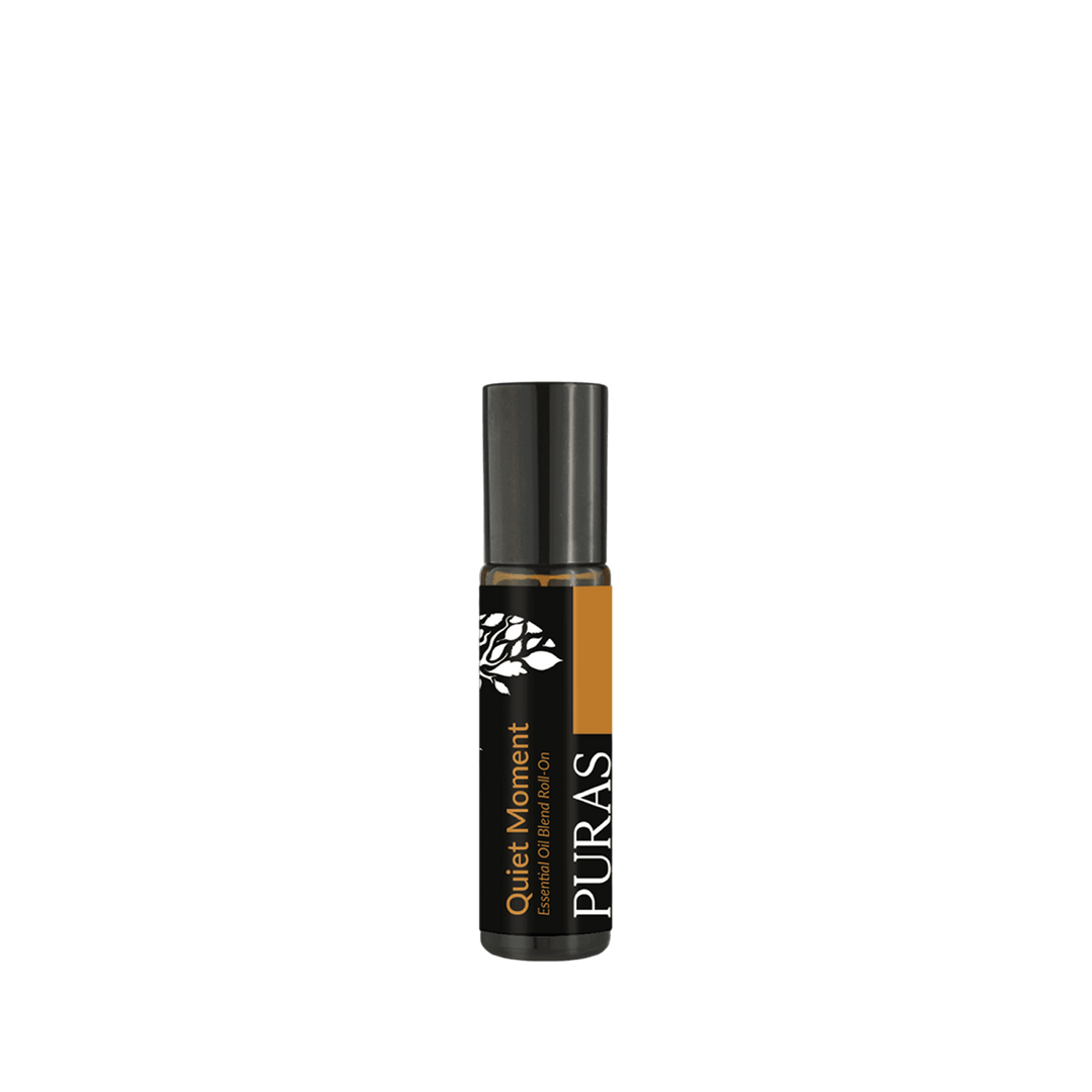 "Quiet Moment" Roll-on bottle with black label on a transparent  background
