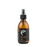 Brown spray bottle with black label on a transparent background