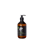 Brown bottle of Puras Revival Scalp Wash on a transparent background